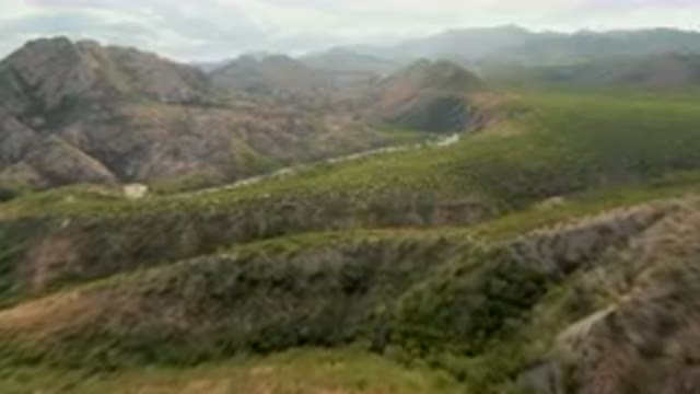 CABO PULMO BCS MEXICO-2024: Mountains With A Winding Road In The Middle Of Them