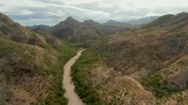 CABO PULMO BCS MEXICO-2024: Dirt Road Winding Through A Valley