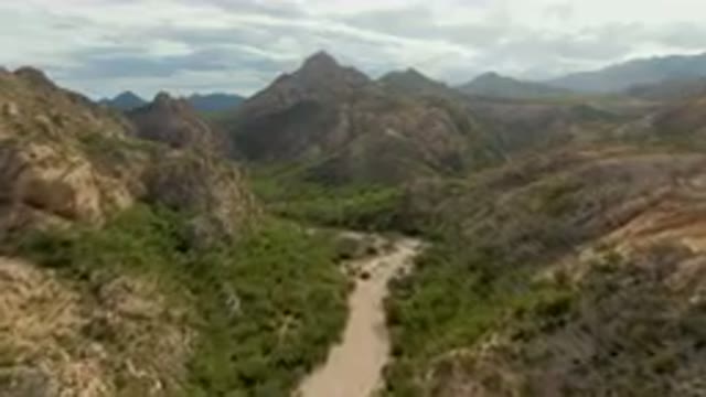 CABO PULMO BCS MEXICO-2024: Dirt Road Winding Through A Valley