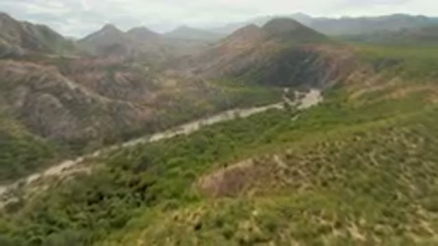 CABO PULMO BCS MEXICO-2024: River Running Through A Valley Surrounded By