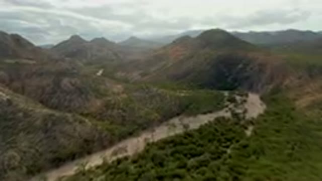 CABO PULMO BCS MEXICO-2024: Winding Road Through A Valley With Mountains In The