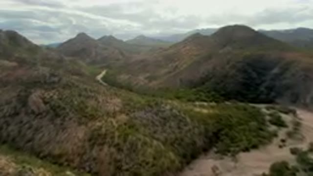 CABO PULMO BCS MEXICO-2024: Winding Road Through A Mountainous Valley