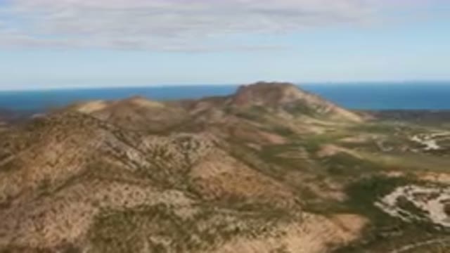 CABO PULMO BCS MEXICO-2024: Valley And A Mountain Range From A Plane