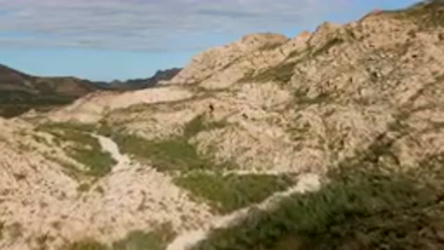 CABO PULMO BCS MEXICO-2024: Train Going Through A Narrow Canyon In The Mountains
