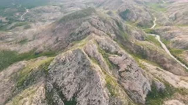 CABO PULMO BCS MEXICO-2024: Aerial View of Winding Road Through Rocky Hills