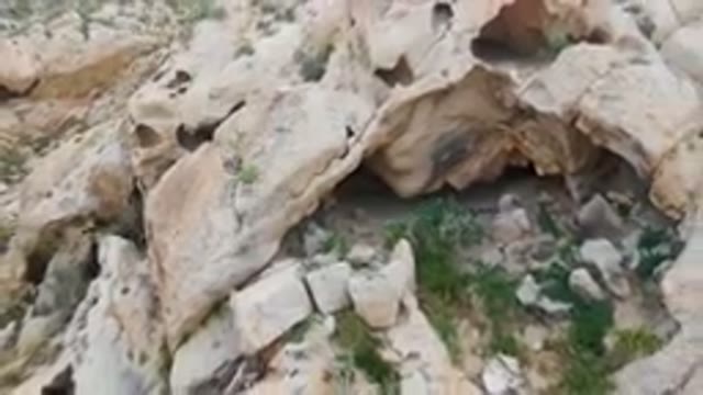 CABO PULMO BCS MEXICO-2024: Large Rock Formation With A Small Cave In The Middle