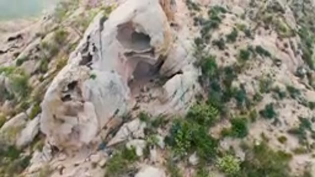 CABO PULMO BCS MEXICO-2024: Large Rock Formation On The Side Of A Mountain
