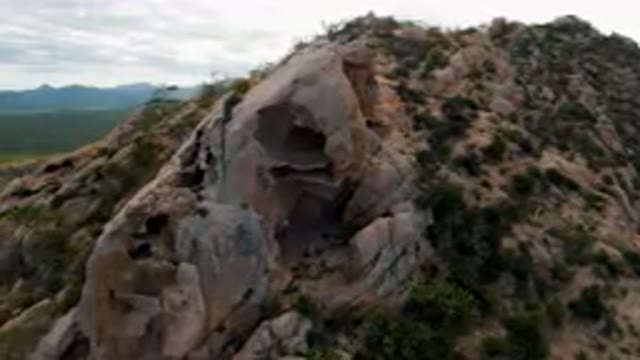 CABO PULMO BCS MEXICO-2024: Large Rock Formation With A Cave In The Middle