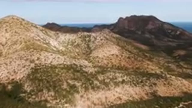 CABO PULMO BCS MEXICO-2024: Two Mountains With A Trail Going Through Them
