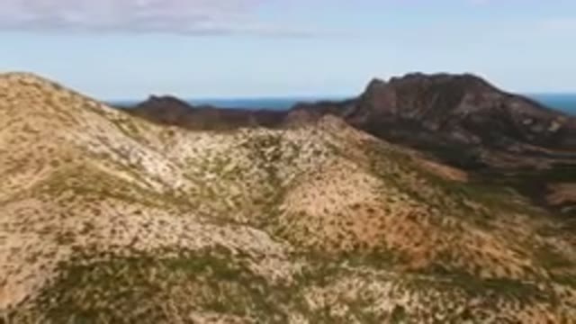 CABO PULMO BCS MEXICO-2024: Aerial View of Arid Mountains and Palm Forest