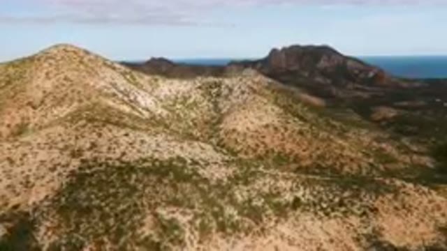 CABO PULMO BCS MEXICO-2024: Two Mountains With A Few Trees On Them