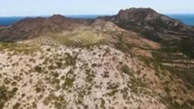 CABO PULMO BCS MEXICO-2024: Aerial View of Arid Mountains and Palm Forest