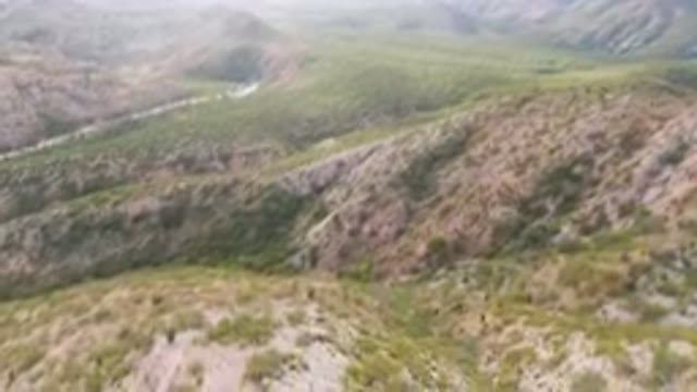 CABO PULMO BCS MEXICO-2024: Man Riding A Horse On A Mountain Trail
