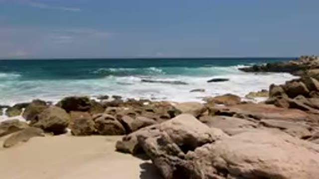 LAGUNA BEACH EAST CAPE BCS MEXICO-2023: Rocky Beach With Waves Crashing On The Shore