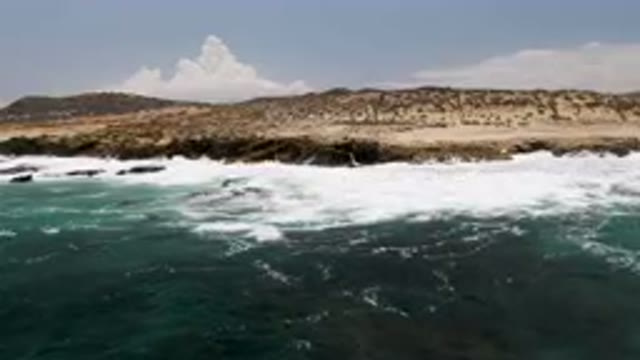 LAGUNA BEACH EAST CAPE BCS MEXICO-2023: Surfers Riding Waves in Epic Ocean Coves