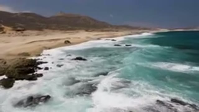 LAGUNA BEACH EAST CAPE BCS MEXICO-2023: Beach With A Rocky Shoreline And A