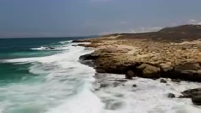 LAGUNA BEACH EAST CAPE BCS MEXICO-2023: Rocky Beach With Waves Crashing On It