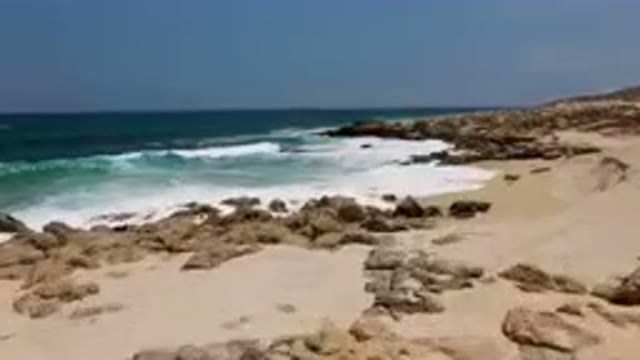 LAGUNA BEACH EAST CAPE BCS MEXICO-2023: Rocky Shore With Waves Crashing Against