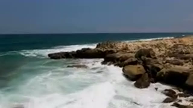 LAGUNA BEACH EAST CAPE BCS MEXICO-2023: Rocky Shore With Waves Crashing Against