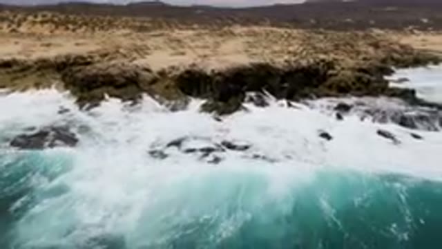 LAGUNA BEACH EAST CAPE BCS MEXICO-2023: Man Riding A Surfboard On A Wave In The