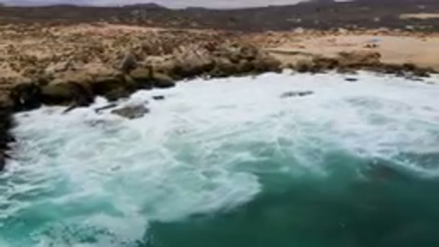 LAGUNA BEACH EAST CAPE BCS MEXICO-2023: Surfers Riding Waves In The Ocean