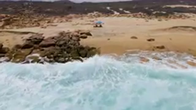 EAST CAPE BCS MEXICO-2023: Beach Umbrellas And Crashing Waves