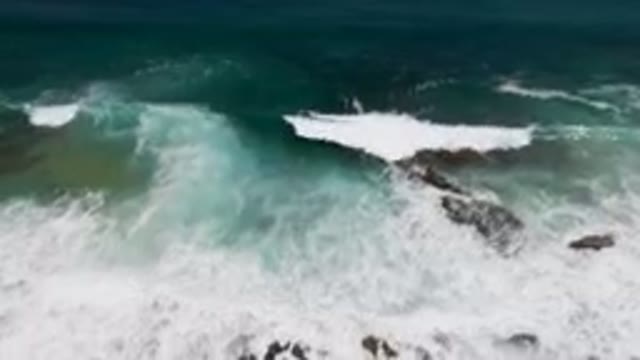 LAGUNA BEACH EAST CAPE BCS MEXICO-2023: Of Waves Crashing On The Rocks In The
