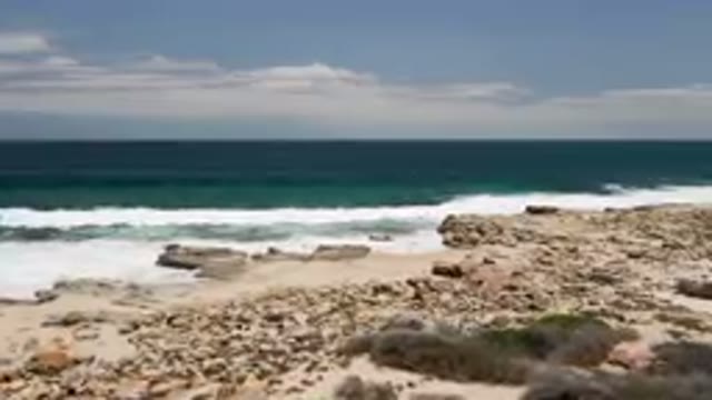 LAGUNA BEACH EAST CAPE BCS MEXICO-2023: Rocky Beach With Waves Crashing On Shore