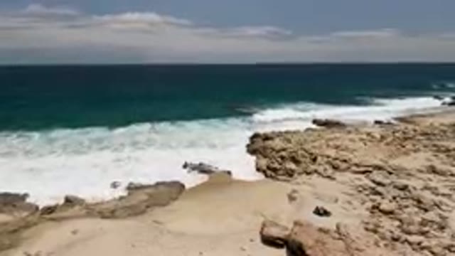 LAGUNA BEACH EAST CAPE BCS MEXICO-2023: Person Laying On A Beach Next To The
