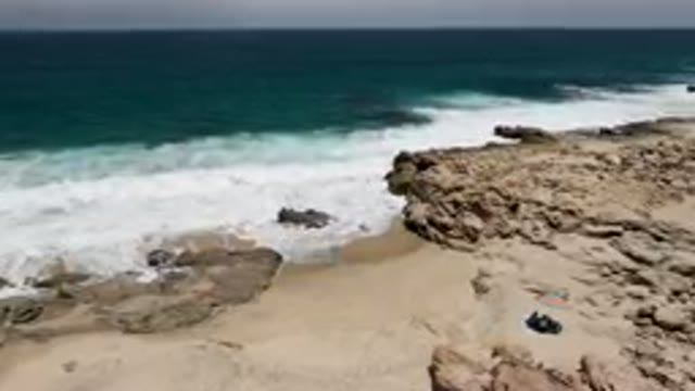 LAGUNA BEACH EAST CAPE BCS MEXICO-2023: Surfers On The Beach With Their Boards