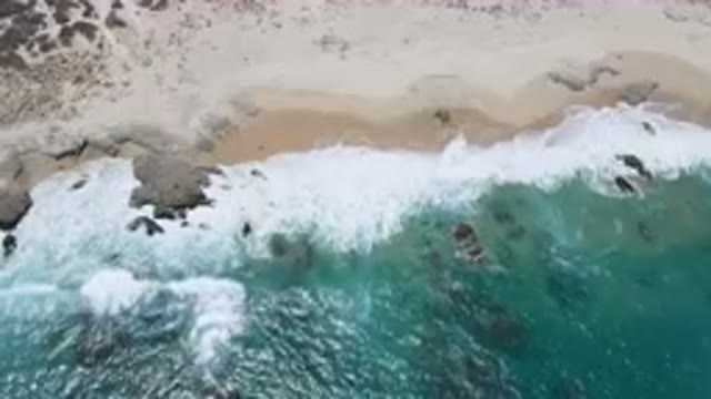 LAGUNA BEACH EAST CAPE BCS MEXICO-2023: Aerial Beach With A Body Of Water And