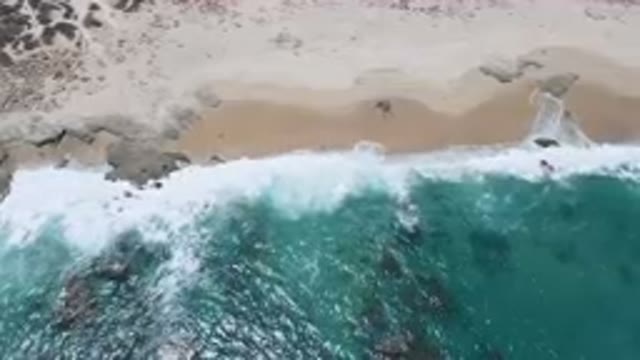 LAGUNA BEACH EAST CAPE BCS MEXICO-2023: Aerial Beach With A Body Of Water And