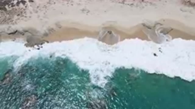 LAGUNA BEACH EAST CAPE BCS MEXICO-2023: Aerial Beach With A Body Of Water And