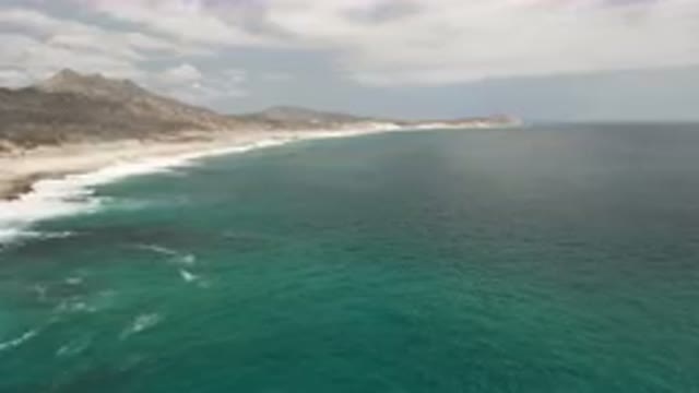 LAGUNA BEACH EAST CAPE BCS MEXICO-2023: Beach With A Body Of Water And A