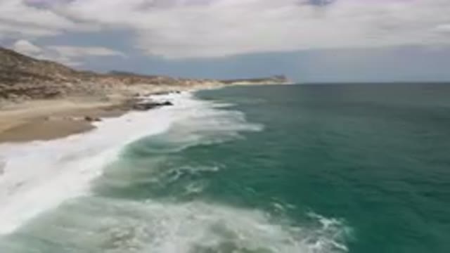 LAGUNA BEACH EAST CAPE BCS MEXICO-2023: Beach With Waves Crashing On The Shore