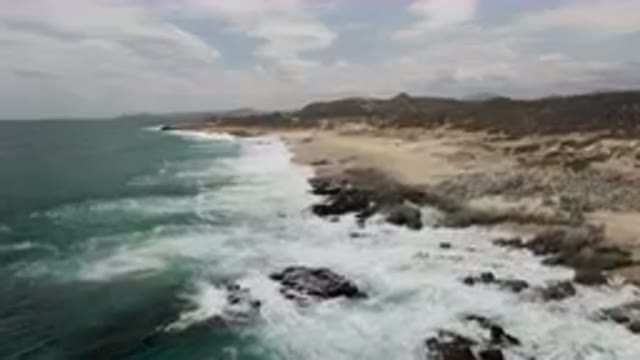LAGUNA BEACH EAST CAPE BCS MEXICO-2023: Beach With A Rocky Shoreline And A Few
