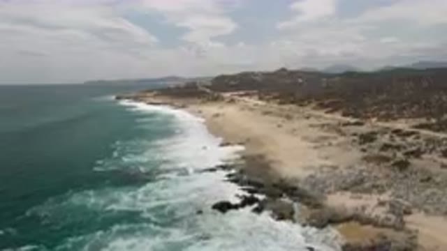 LAGUNA BEACH EAST CAPE BCS MEXICO-2023: Beach With A Rocky Shoreline And A Few