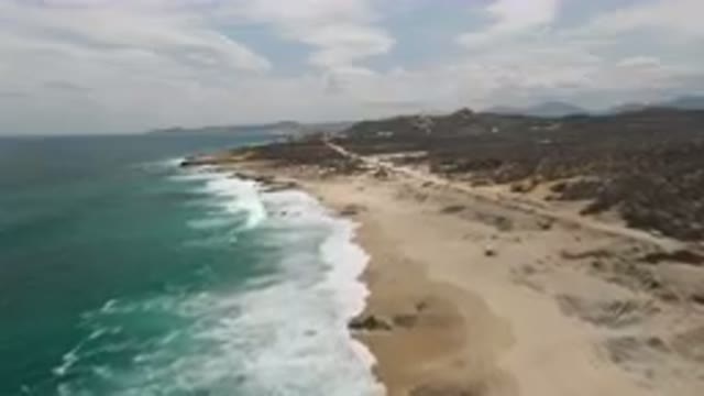 LAGUNA BEACH EAST CAPE BCS MEXICO-2023: Beach With A Lot Of Sand And Water