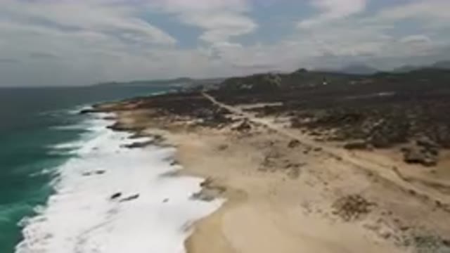LAGUNA BEACH EAST CAPE BCS MEXICO-2023: Beach With A Lot Of Sand And Water
