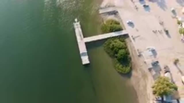 ALDOFO LOPEZ MATEOS BCS MEXICO-2023: Aerial Dock With A Boat Docked On The Water
