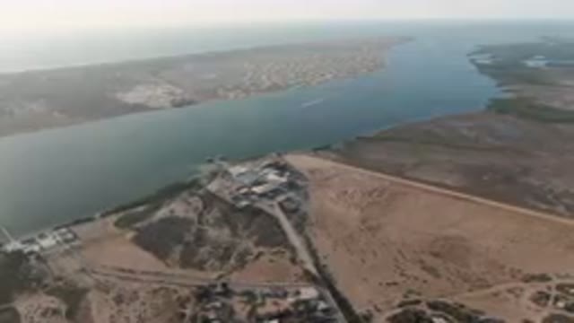 ALDOFO LOPEZ MATEOS BCS MEXICO-2023: Aerial Large Body Of Water With A Town In
