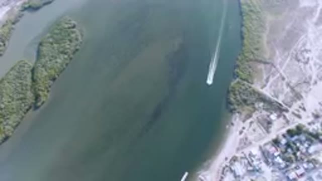 ALDOFO LOPEZ MATEOS BCS MEXICO-2023: Aerial Boat Traveling Through A Body Of Water