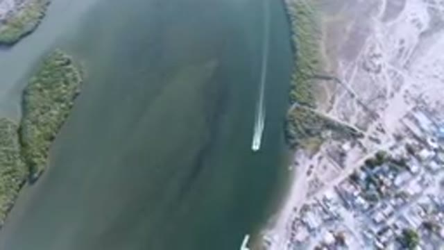 ALDOFO LOPEZ MATEOS BCS MEXICO-2023: Aerial Boat Traveling Through A Body Of Water