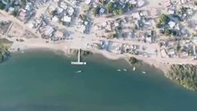ALDOFO LOPEZ MATEOS BCS MEXICO-2023: Aerial City With A Boat In The Water