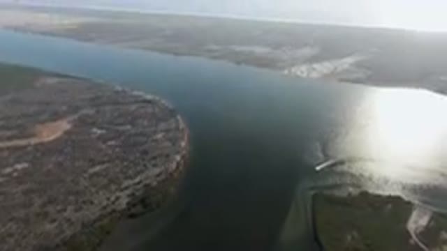ALDOFO LOPEZ MATEOS BCS MEXICO-2023: Aerial View of River Delta With Boat