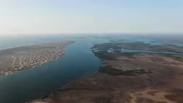 ALDOFO LOPEZ MATEOS BCS MEXICO-2023: Wide Body Of Water With A Beach And Land