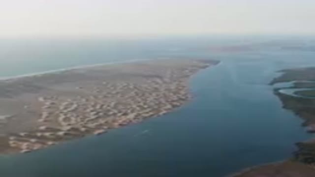ALDOFO LOPEZ MATEOS BCS MEXICO-2023: Wide Body Of Water With Sand Dunes And A