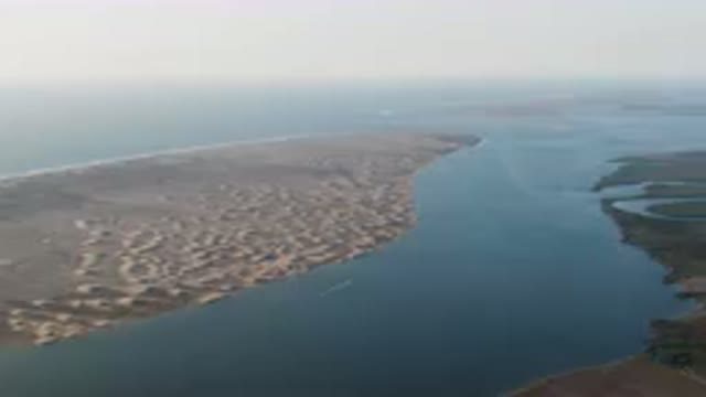 ALDOFO LOPEZ MATEOS BCS MEXICO-2023: Wide Body of Water With a Beach and Sand