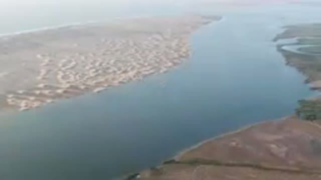 ALDOFO LOPEZ MATEOS BCS MEXICO-2023: Wide Body Of Water With A Beach And A Body