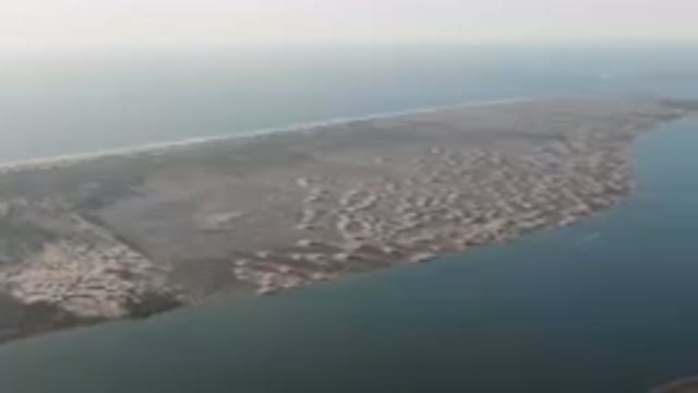 ALDOFO LOPEZ MATEOS BCS MEXICO-2023: Large Body Of Water With A Beach In The